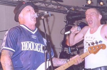 Portrait or other artwork representing [{296195b9-2dd4-4692-bcab-ecc2753ca2c1 Artist the-business.jpeg} {9130bea8-a727-47cc-843c-7f11924d00c9 Release matts-punk-3.jpeg} {a619c07f-2a23-463c-8d80-1228ae287517 Release matts-punk-4.jpeg} {e6f85c25-cf9c-41bd-83aa-aecf25c9cf8b Release punk-o-rama-2001-vol-6.jpeg}]