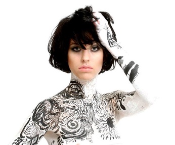 Portrait or other artwork representing [{0652995a-6031-4ad9-805f-da73ef4bdfaa Release vows.jpeg} {4eb6df6b-02e5-4b21-bc9a-84ed880edc96 Artist kimbra-2.jpeg} {4eb6df6b-02e5-4b21-bc9a-84ed880edc96 Artist kimbra-3.jpeg} {4eb6df6b-02e5-4b21-bc9a-84ed880edc96 Artist kimbra.jpeg} {eab19665-7f57-4656-b844-3c482ef73bb2 Release the-golden-echo.jpeg}]