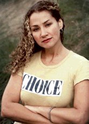 Portrait or other artwork representing [{25ba759f-a70a-4450-a6df-a79748a77181 Release jenns-dark-mix.jpeg} {5dc70716-7d31-4d4a-b2d4-2cf344285e7f Artist joan-osborne.jpeg}]