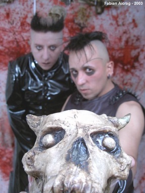 Portrait or other artwork representing [{2d9cfeb2-e0fc-4e16-ba65-b7647e91b271 Release hyperviolent.jpeg} {574f8f40-5f59-416b-b9b2-a9a1a5768c66 Release hate-never-dies-the-remix-celebration.jpeg} {6e671698-0632-4042-bc90-8af15008cbce Release wrack-and-ruin.jpeg} {6e88ddc0-f301-40cb-885a-65bff83bd95f Artist hocico.jpeg} {bc9a1fe0-993b-4f17-a4f4-b72f0849fa8c Release memorias-atras.jpeg} {c42a23e6-4d8d-41ca-9d96-5ebd41f67ed6 Release cop-22nd-anniversary-compilation.jpeg} {d9eebceb-c3f7-4e7a-9dd6-47d092638831 Release sangre-hirviente.jpeg} {e6c52c85-511d-4168-9863-50776f9897fc Release tiempos-de-furia.jpeg}]