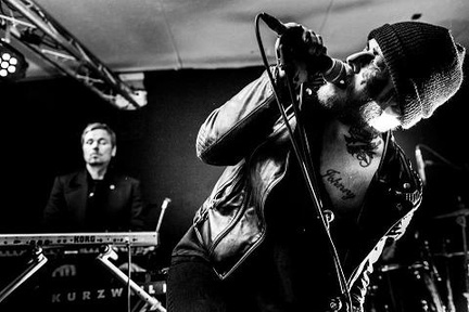 Portrait or other artwork representing [{19dd6e87-59b4-4611-b69f-6c94e74a8beb Release fearless-2.jpeg} {19dd6e87-59b4-4611-b69f-6c94e74a8beb Release fearless.jpeg} {5f25390c-c669-4cc5-ab32-6182a222c680 Release devil-in-me.jpeg} {6fd49f6a-8faf-4fe9-b691-1be469a6d506 Artist legend.jpeg} {a5877981-fd95-46fd-be14-f58ade7287dd Release industrial-music-sampler-2-artoffact-records.jpeg} {a8f0071d-703c-49f4-b9a9-38b361eda313 Release midnight-champion.jpeg}]