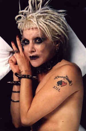 Portrait or other artwork representing [{3ce78061-20e5-4a7f-ae59-c49e38fd81c3 Release gothic-rock.jpeg} {61ce6e52-e521-498b-9fb3-ebfa483711be Release gothik-music-from-the-dark-side.jpeg} {7651615c-25f7-4e7e-bcb7-a0eb8a791126 Artist gitane-demone-2.jpeg} {7651615c-25f7-4e7e-bcb7-a0eb8a791126 Artist gitane-demone.jpeg}]