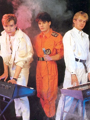 Portrait or other artwork representing [{4ae4e2bf-28e1-45b0-864c-2cd7f2c841a3 Release forever-young-and-other-hits.jpeg} {780982d3-6c64-4142-8324-cadfe8186401 Artist alphaville-2.jpeg} {780982d3-6c64-4142-8324-cadfe8186401 Artist alphaville-3.jpeg} {780982d3-6c64-4142-8324-cadfe8186401 Artist alphaville.jpeg}]