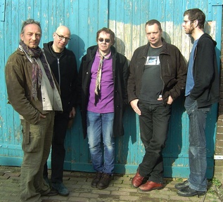 Portrait or other artwork representing [{0c4041ae-1ece-4960-9f48-15a68f1fea63 Release so-lonely-in-heaven.jpeg} {359e8a88-423b-4cc2-8ce1-f8947b0b9adc Release from-here-you-ll-watch-the-world-go-by.gif} {405f29c9-818b-4aa2-8225-01a7c5f32107 Release any-day-now.jpeg} {7a5108ba-e898-4d84-85ce-2d2296cc1627 Artist the-legendary-pink-dots.jpeg} {a4ce4d61-3126-4c17-b055-2876129e3aeb Release the-crushed-velvet-apocalypse.jpeg} {ee2bff67-3163-4796-999f-37c953acdbc8 Release all-the-kings-men.jpeg} {fcb40893-54ee-418d-b180-a7f04209cd80 Release nemesis-online.jpeg}]