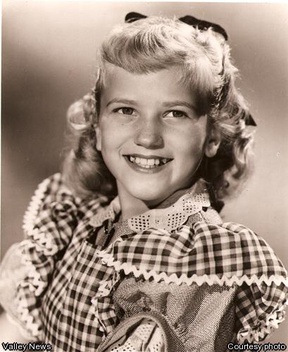 Portrait or other artwork representing [{93355363-3cdc-48d5-8524-02aa1f978d91 Artist gayla-peevey.jpeg} {d74e573a-86c9-4a2f-9e30-9e023bf0afee Release dr-demento-presents-the-greatest-christmas-novelty-cd-of-all-time.jpeg}]