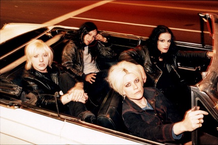 Portrait or other artwork representing [{32ada70d-100b-470d-aed0-37d617430da9 Release more-songs-about-anger-fear-sex-and-death.jpeg} {69660221-3449-410c-a124-ab3978a3f49f Release bricks-are-heavy.jpeg} {d367b058-2a97-4351-a862-21f64ccbe10e Artist l7-2.jpeg} {d367b058-2a97-4351-a862-21f64ccbe10e Artist l7-3.jpeg} {d367b058-2a97-4351-a862-21f64ccbe10e Artist l7.jpeg}]