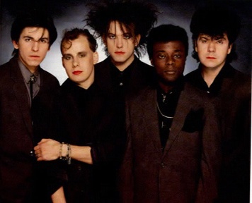 Portrait or other artwork representing [{0afe4fe1-7a02-4b4e-aa73-5bb688812ded Release disintegration.jpeg} {3e5b348f-ac33-46d8-8787-5a99b191fe39 Release kiss-me-kiss-me-kiss-me.jpeg} {4499d4f1-2b55-4baa-904b-3f8e45a5dd38 Release mixed-up.jpeg} {646fa16e-d908-4257-92ae-0208e69b049d Release mix-from-shannon-2.jpeg} {9c6f0c37-bff2-4ad0-89fa-fa8e78f63975 Release bloodflowers.jpeg} {bdafe4b4-b22f-4277-b872-b63951abd47d Release chi-town-mix.jpeg} {cb9f7dd5-8a13-4ffb-a509-84987dc7e81f Release staring-at-the-sea-the-singles.jpeg} {d5f3f7e7-194b-46ca-bfd2-8236b6fb5a91 Artist the-cure.jpeg} {dcd07eb0-2309-4b3f-86fa-eba92681de13 Release galore.jpeg} {e63909b3-ec90-445b-80a9-b342b36f6269 Release the-crow.jpeg}]