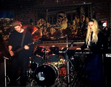 Portrait or other artwork representing [{895722f9-cedd-4c8f-a970-7496e182a002 Release kindred-spirits.jpeg} {f3bfa7af-646f-435e-b5ce-6cdabf4c256f Artist siddal-2.jpeg} {f3bfa7af-646f-435e-b5ce-6cdabf4c256f Artist siddal.jpeg}]